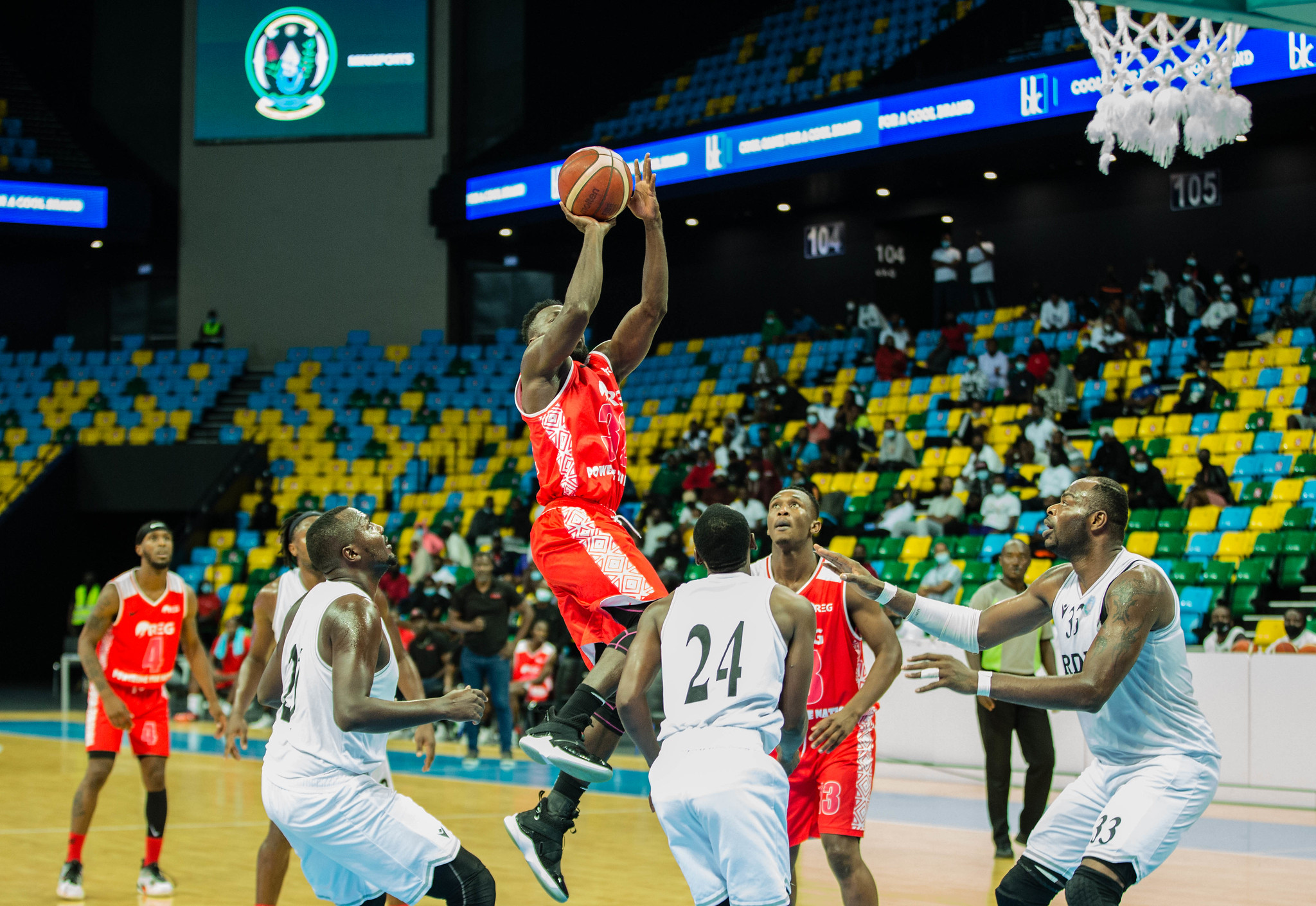 REG player with the ball during their match against APR BBC at Kigali Arena in September 2021. Dan Nsengiyumva