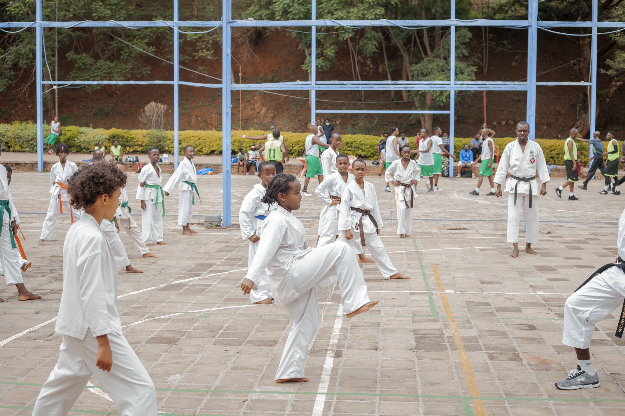 Sports Genix International academy launched with 90 children in January. The youngsters are trained in karate, football and basketball. Net photo.