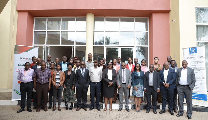 Participants pose for a group photo. IPAR-Rwanda and PASGR, with support of Mastercard Foundation, organized the project inception workshop in Kigali on March 30. / Photo: Craish Bahizi.