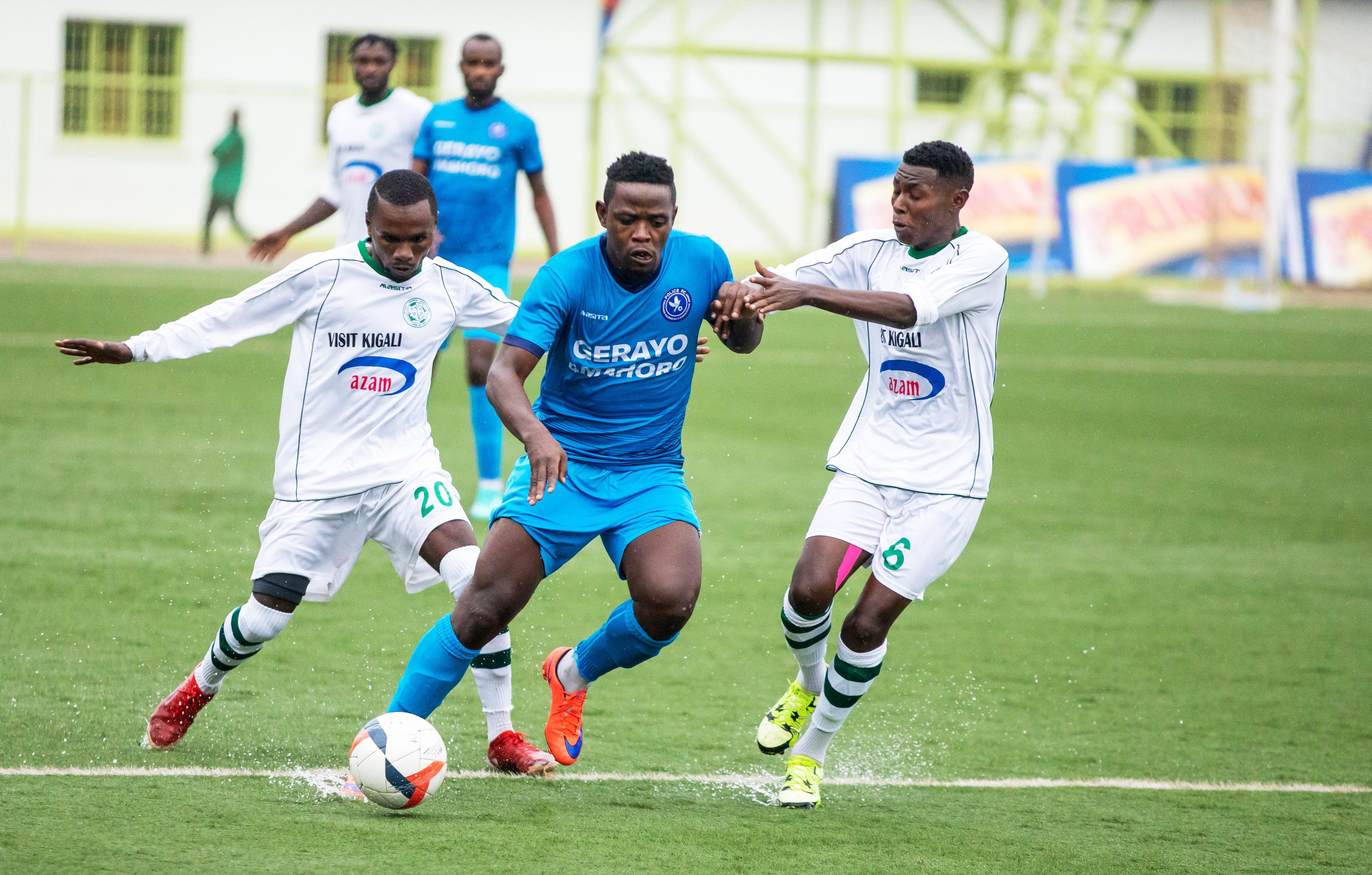Police FC attacking midfielder Muhadjili Hakizima tries to get past two Kiyovu players in a past league match at Kigali Stadium. Police will host Musanze while Kiyovu will take on Gasogi. Photo: Olivier Mugwiza.