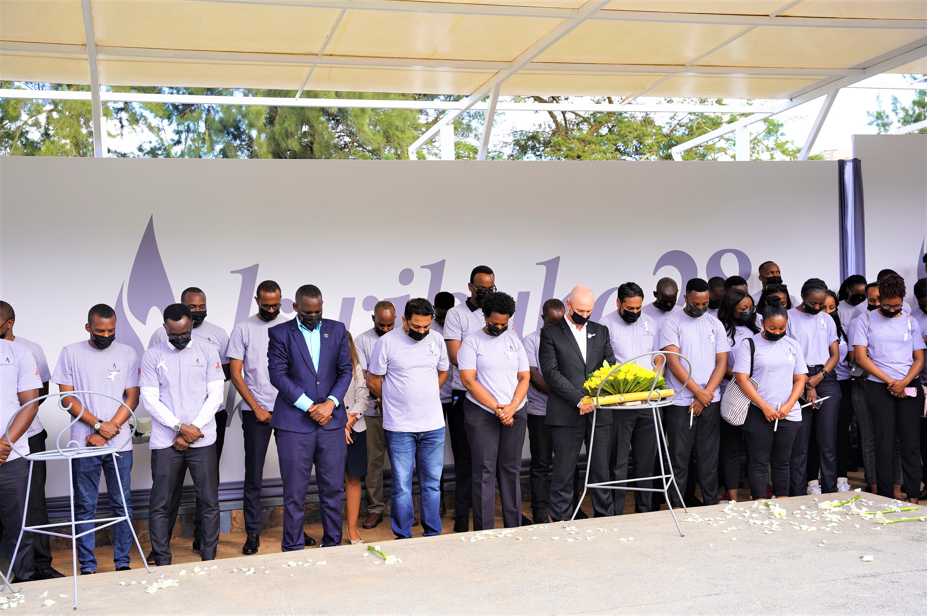 Kigali Marriot Hotel  management and staff  observe a moment of silence to pay tribute to the victims of the Genocide against the Tutsi at Kigali Genocide Memorial on Apri 19. / Craish Bahizi