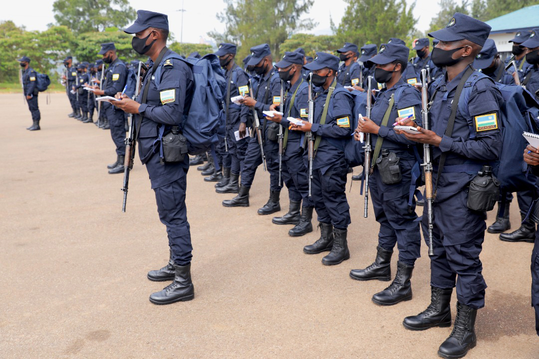  Some of the police officers take notes during the briefing by the Deputy Inspector General of Police in charge of Operations, Felix Namuhoranye. in Kigali on April 21. 