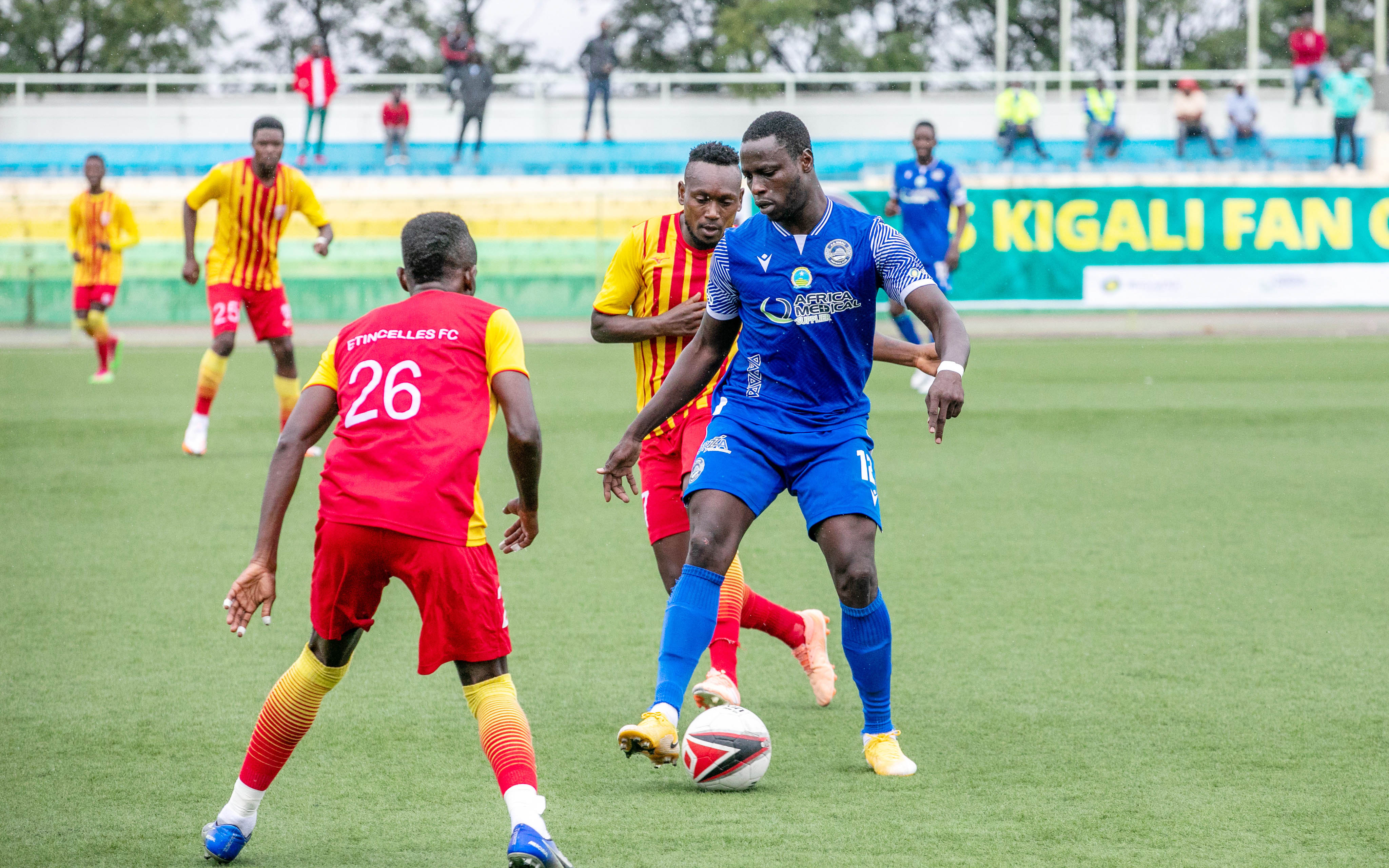 AS Kigali striker Michael Sarpong dribbles past Etincelles defenders during the Peace Cup.The former  Rayon Sports striker revealed that facing his former team will be a special occasion for him.Photo by Olivier Mugwiza