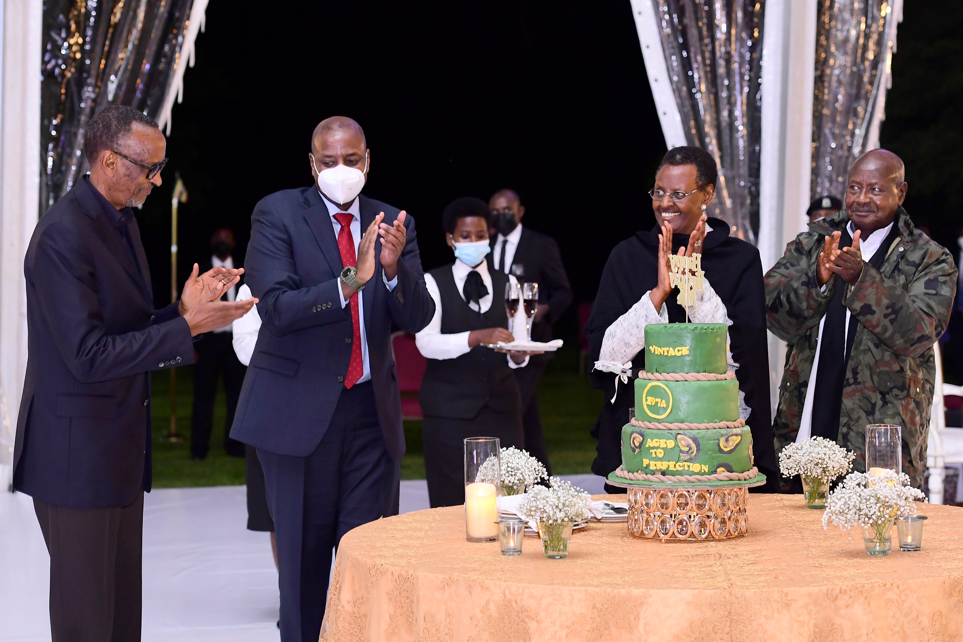 President Kagame, Lt Gen Muhoozi Kainerugaba, First Lady Janet Museveni and President Museveni applaud at Muhooziu2019s 48th birthday dinner at State House Entebbe on Sunday, April 24. 