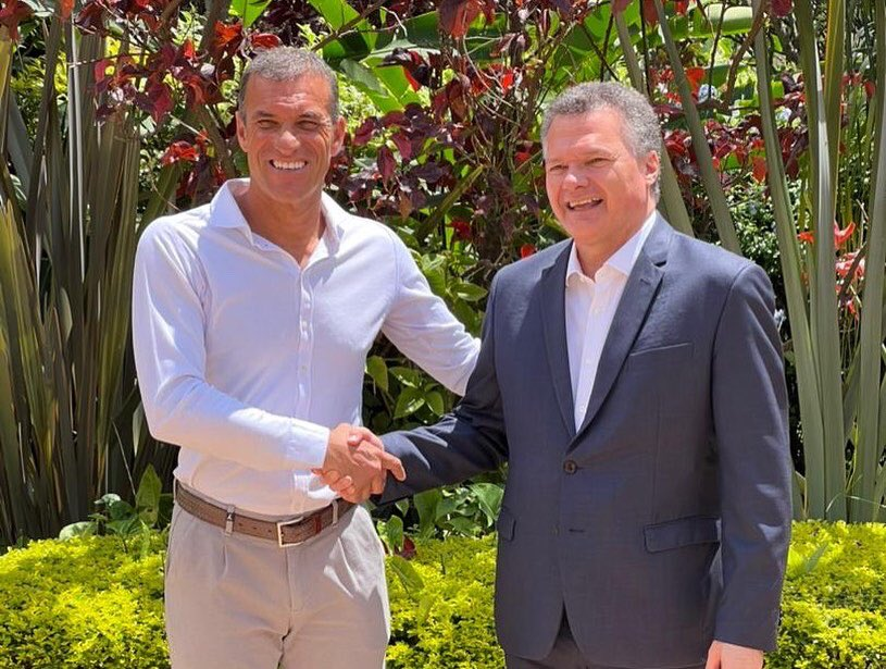 Christophe Pinna (L) was welcomed by French Ambassador to Rwanda Antoine Anfru00e9. 