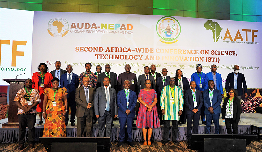 Delegates pose for a group photo during the Africa Wide Science Technology and Innovation Conference in Kigali on April 26.  The two-day conference  is under the theme u201cDeepening Conversations to strengthen the role of Science, Technology, and Innovation (STI) in transforming agriculture and food systems in Africa.u201d  / Photo by  Craish Bahizi