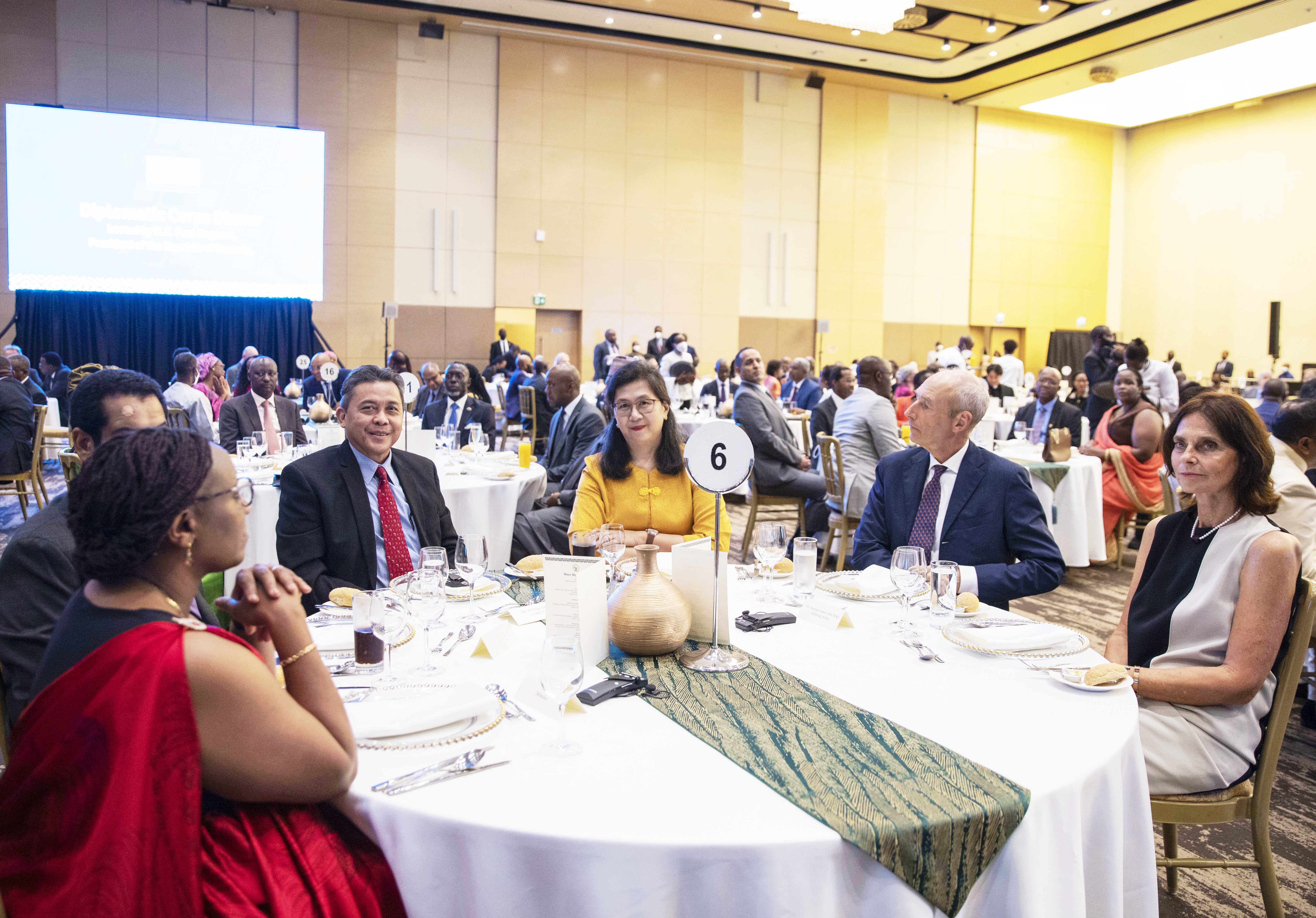Members of the diplomatic corps follow President Kagame 's remarks during a dinner event on April 26. Photo by Village Urugwiro.
