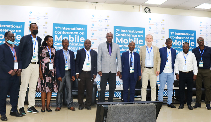 Officials pose for a group photo during the seventh edition of the international conference on mobile communication technology for development. / Photo: Courtesy.