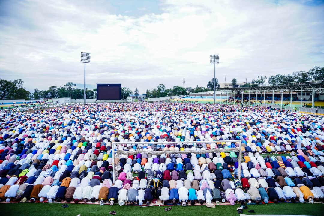 Thousands of Muslims during the morning prayer to celebrate Eid al-Fitr at Kigali Stadium on Monday, May 2. The Mufti of Rwanda, Sheikh Salim Hitimana, urged the Muslim community to sustain activities of love, re-examine themselves and approach Allah, as well as continue to work hard for a better future. / Photo: Dan Nsengiyumva.