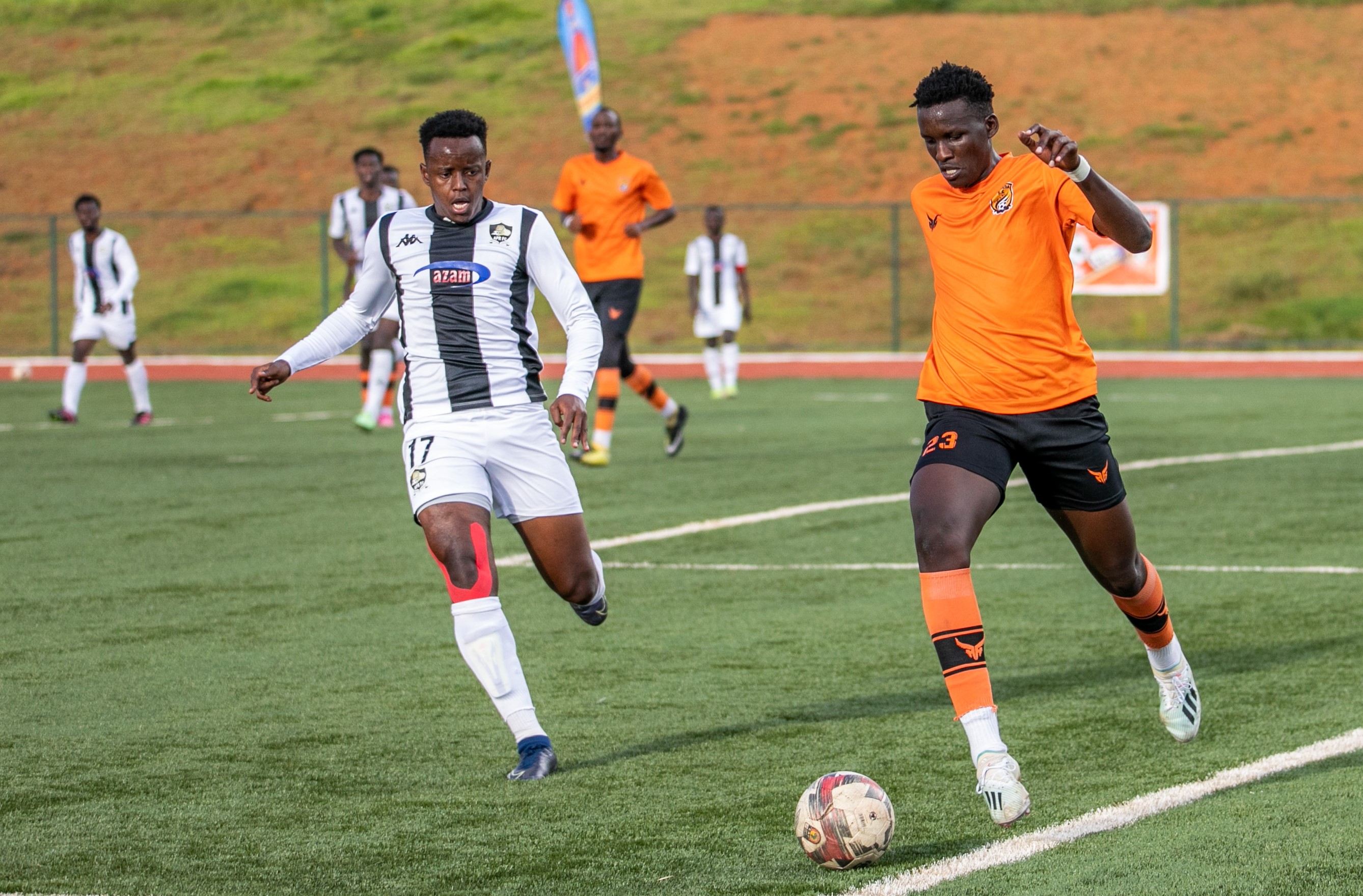 Bugesera FCu2019s Abdul Muniru controls the ball against APR FCu2019s striker Innocent Nshuti during the game. Olivier Mugwiza.