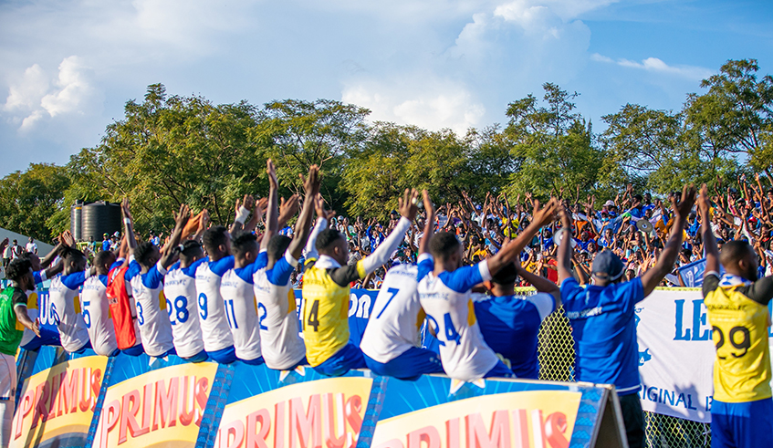 Rayon Sports players and staff cheer on their supporters after beating AS Kigali 1-0 during the second leg game at Kigali Stadium on April 23, 2022. / Photo by Olivier Mugwiza