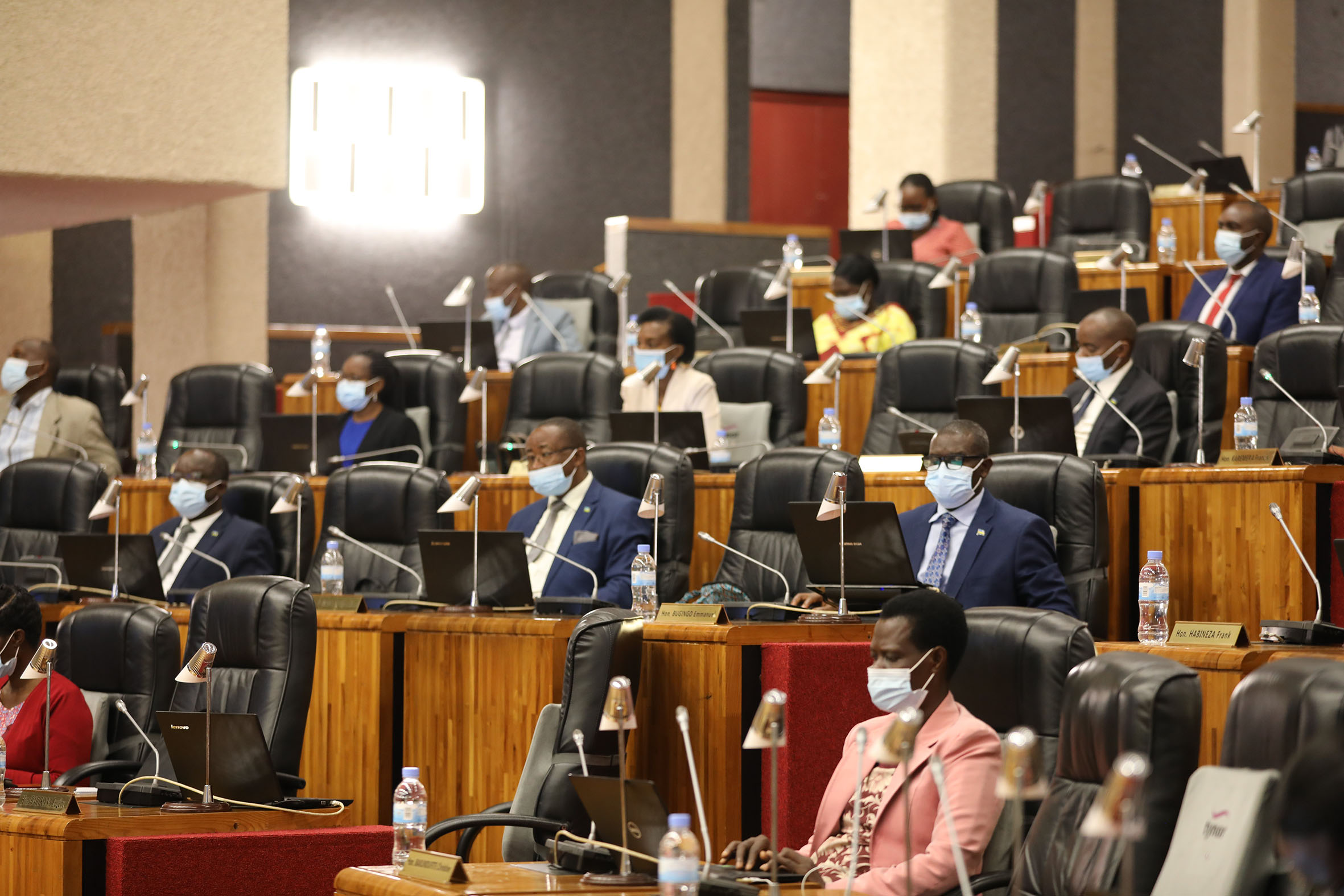 Members of Parliament during a plenary session in 2020. MPs have adopted a resolution to summon the Minister for Environment to provide explanations to issues identified in land management and use. / Photo: Craish Bahizi.