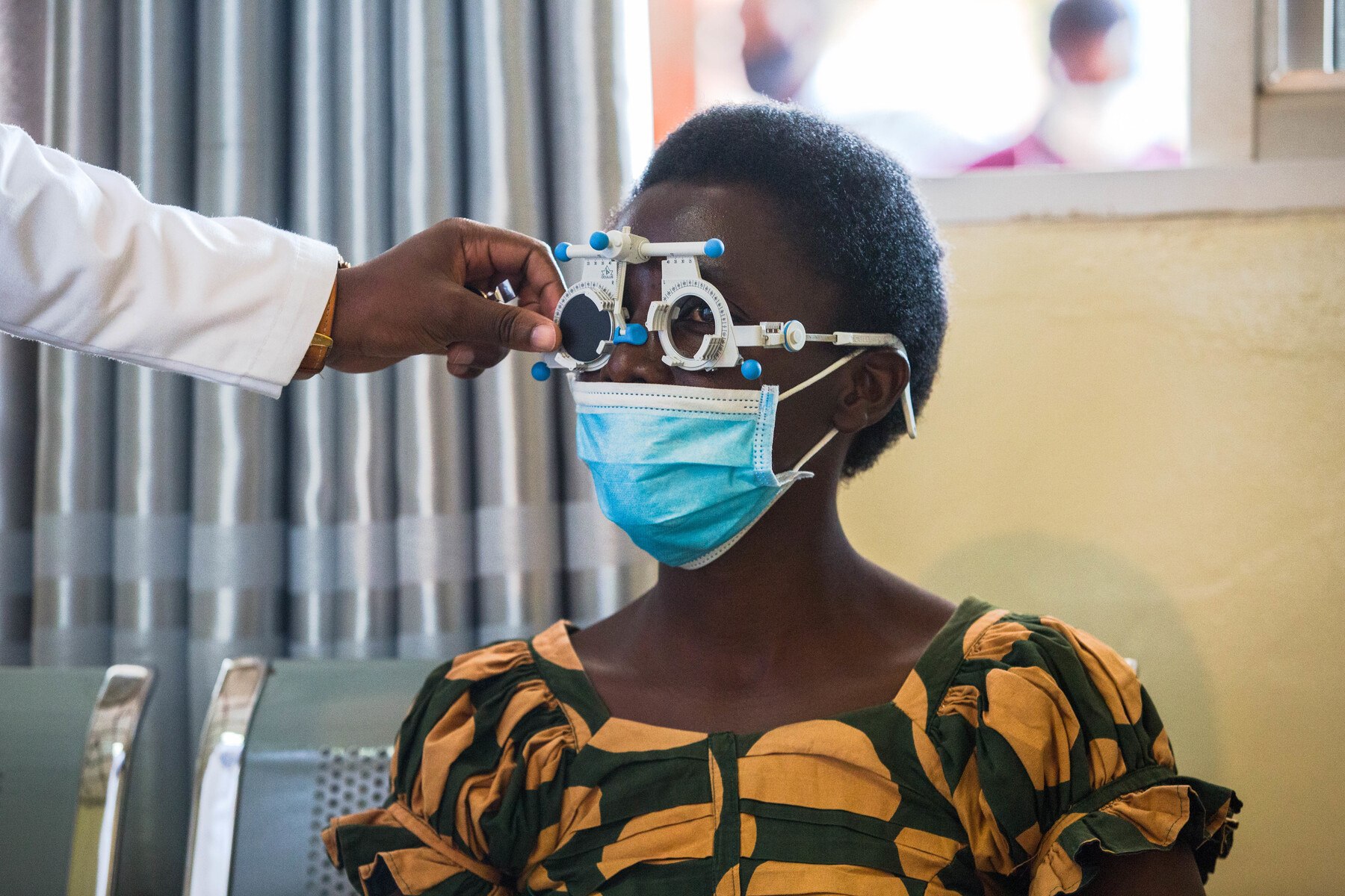 An eye patient undergoes a screening exercise  during launch of the first community optical center at Kibagabaga hospital on October 8, 2020. 