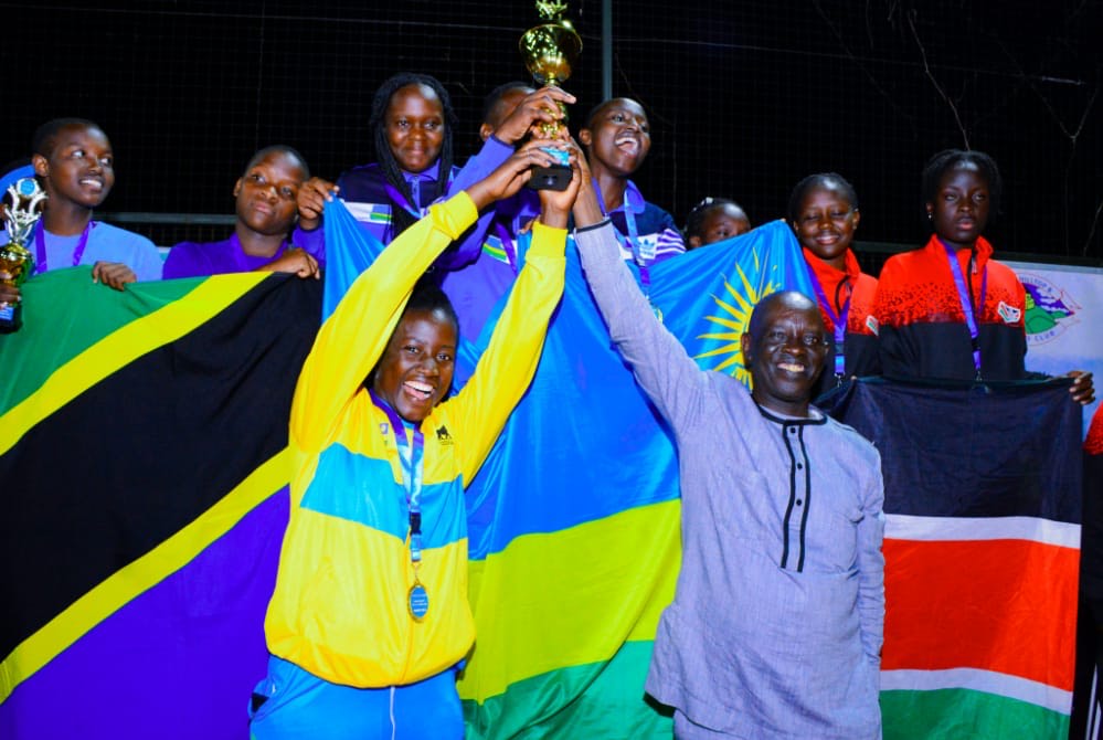 Rwandau2019s U-16 boy team hoist the trophy as they celebrate after beating Burundi in Sunday final. 