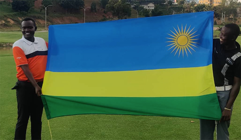Aloys Nsabimana and Celestine Nsanzuwera pose for a photo before leaving Kigali to take part in the 22nd Open De Cote D'Ivoire Trophee Felix Houphouet Boigny golf tourney. / Courtesy