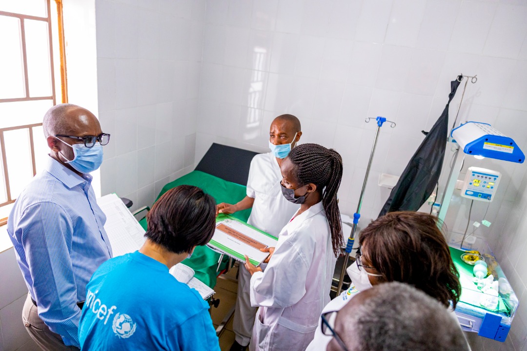 Minister in charge of Primary Health care Tharcisse Mpunga interacts with nurses who will treat patients at the newly inaugurated Health Posts in Nyaruguru District on May 10.