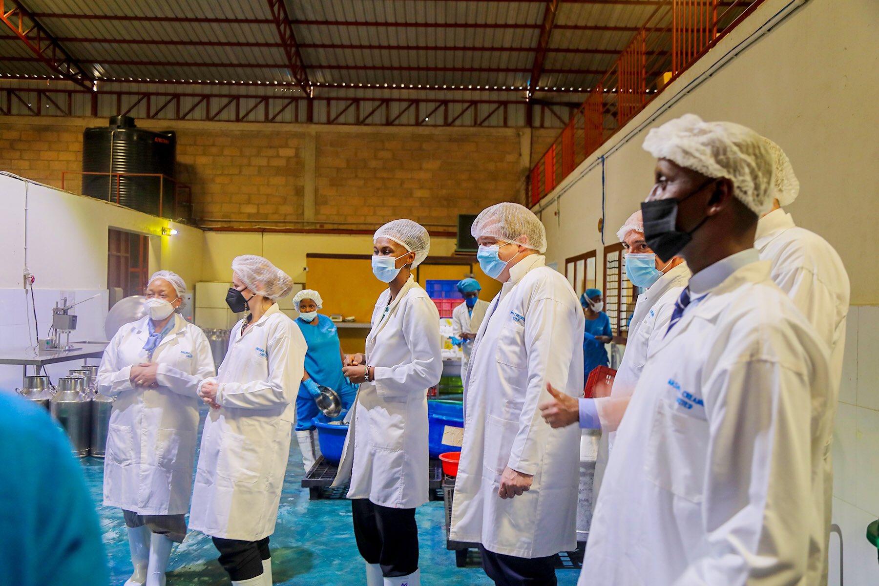 Dominik Ziller, the Vice President of the International Fund for Agricultural Development (IFAD) with the delagation  tour at the Masaka Creamery Ltd , a Kigali-based dairy processing factory on May 10. 