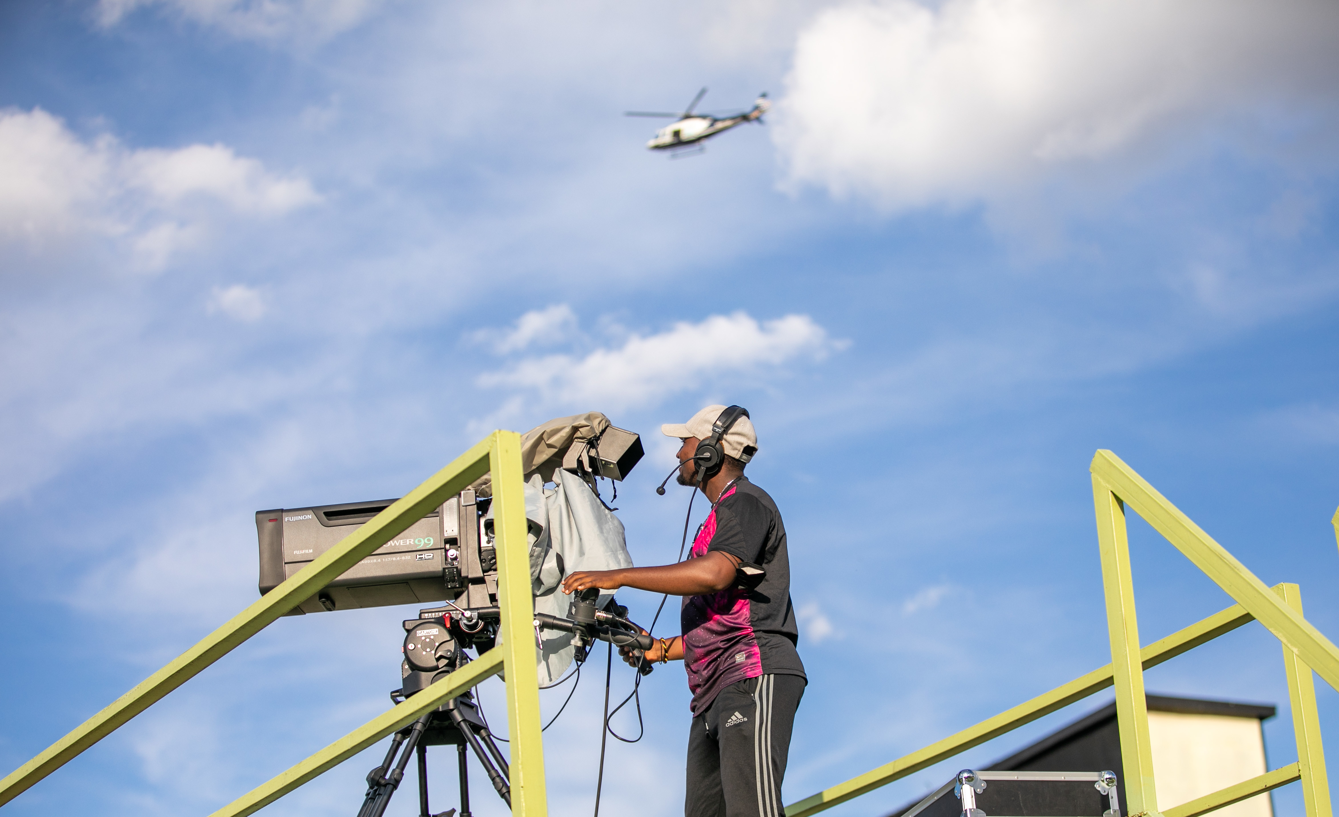 An RBA cameraman covering a league match at Kigali Stadium. RBA and Ferwafa are embroiled in a dispute over third party fees that the former got from Star Times to showcase league matches. / Photo: Olivier Mugwiza.