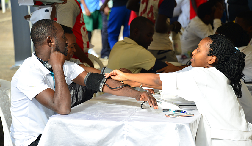 Kigali residents undergo check up of hypertension during csr free day.May 17th of every year is dedicated to raising global awareness for hypertension and promoting its prevention. Dan Nsengiyumva