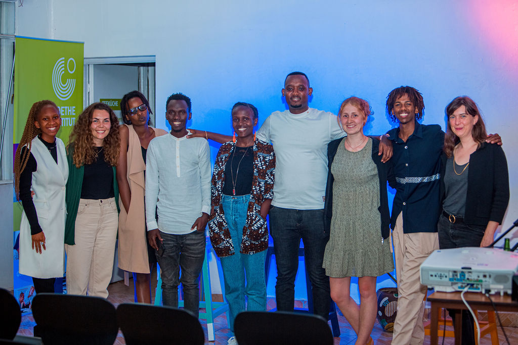 The performers of u2018Joint of Threeu2019 with Mustapha Kayitare, co-founder of Transpoesis (centre) and director of Goethe Institut Kigali, Regina Sarreiter (far right). Photo/ Net