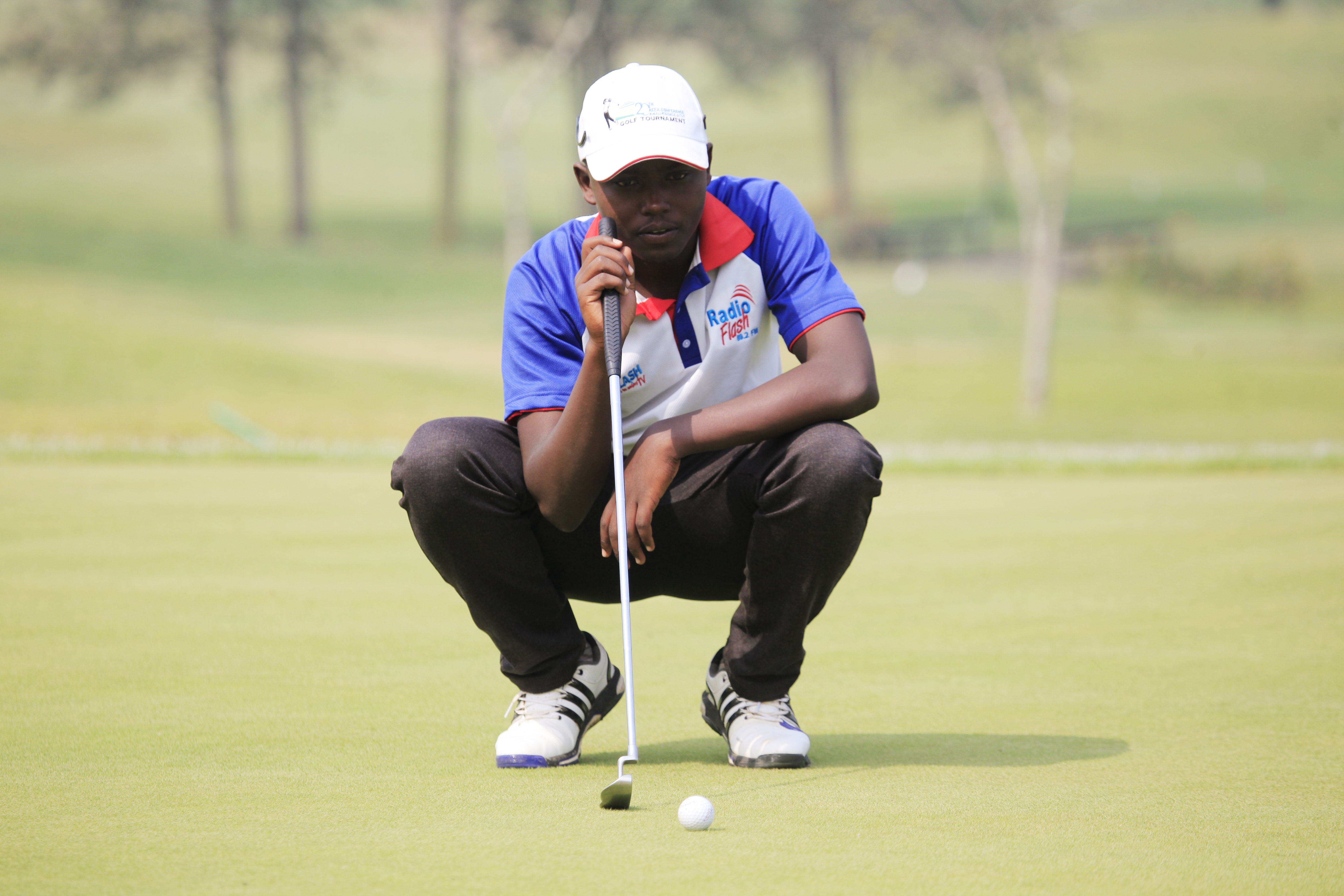 Rwandan golfer Aloys Nsabimana at the par 72 Kigali golf course. Nsabimana and his brother Celestine Nsanzuweraare are representing the country in a golf competition in Zimbabwe. Photo: Sam Ngendahimana.