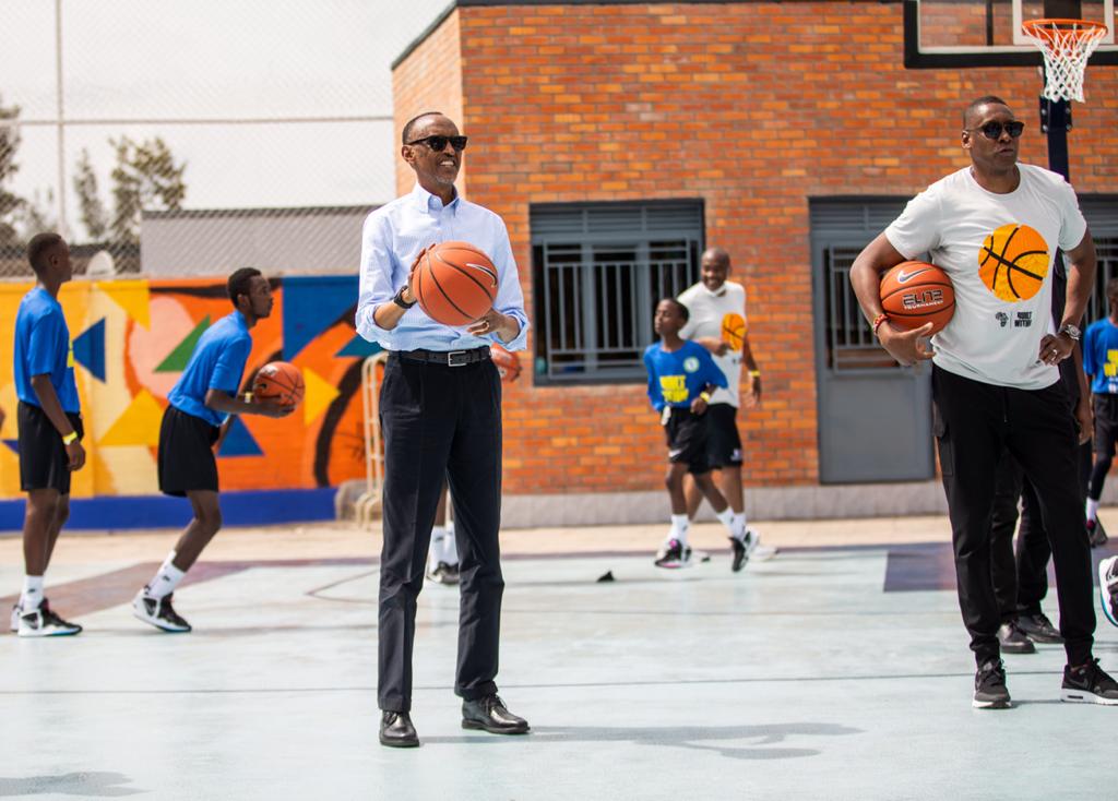 President Paul Kagame and Masai Ujiri, President of the Toronto Raptors at the unveiling of Club Rafiki Youth Centeru2019s refurbished basketball court on Saturday. 