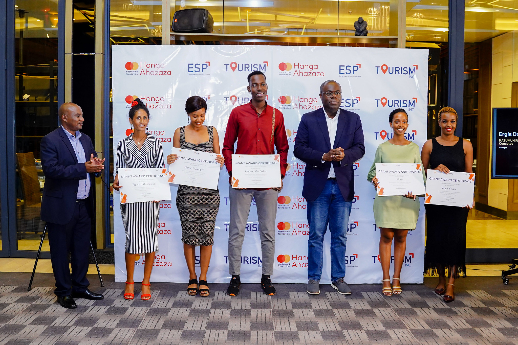 The 5th cohort of entrepreneurs that was  trained in Rwanda pose a group photo  during the graduation ceremony in Kigali on Friday, May 27. Photos by Dan NsengiyumvaPhotos: Dan Nsengiyumva