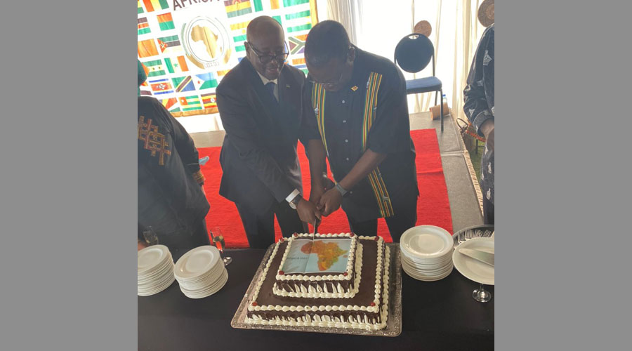 The Acting Dean of African Diplomats in Zimbabwe Ambassador Musoni cutting cake during Africa Day commemorations held in Harare on Friday.