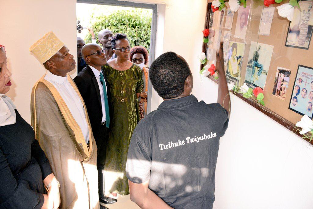 Mufti of Rwanda Salim Hitimana flanked by other officials visit a photo gallery that shows photos of the victims at Ecole Primaire Intwari. / Courtesy