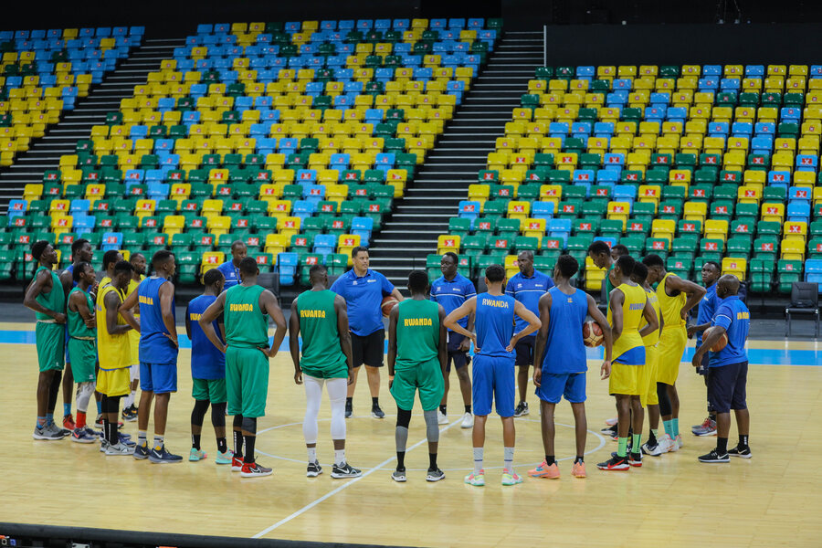 National basketball team players listen to coach Sarr's briefings during a training at BK Arena. 