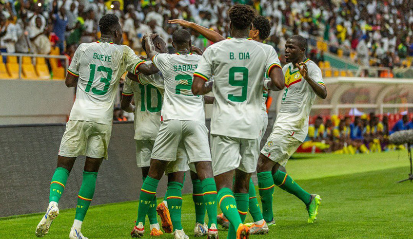  Senegal players celebrate after Sadio Mane scored a last minute goal that gave them a 1-0 win over the Amavubi. Net