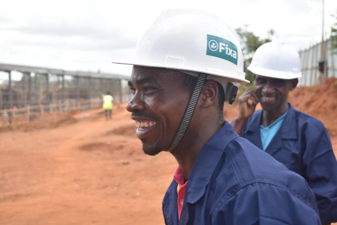 Some of the workers with Fixa. Courtesy photo