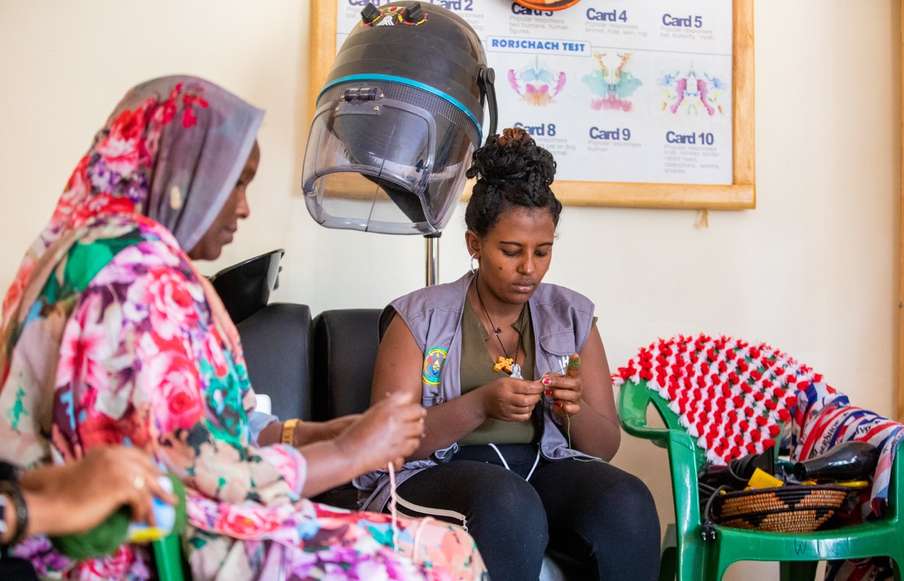 Women in a hair dressing salon Gashora Transit center that is located in Gashora sector, Bugesera district. The Center has hosted a total of 1,055 refugees and asylum seekers since September 2019. 