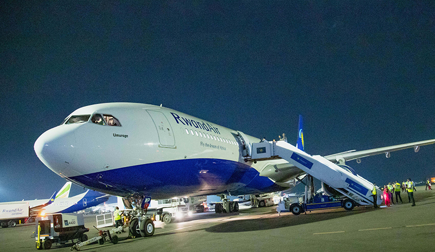 Rwandair's airplane at Kigali International Airport. RwandAir has offered a 15 per cent saving off flights for passengers across its extensive network, in line with the forthcoming Heads of Government Meeting (CHOGM). / File
