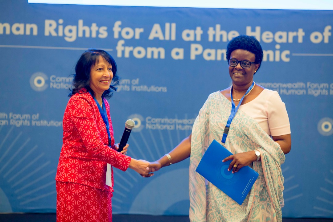 Baroness Kishwer Falkner, the chair of CFNHRI and The Equality and Human Rights Commission of Great Britain and Marie Claire Mukasine, the chairperson of the Rwanda National Commission for Human Rights during the handover . / Courtesy