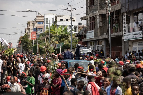 Demonstrators attempt to reach the border post between the Democratic Republic of Congo and Rwanda in Goma on June 15, 2022. 