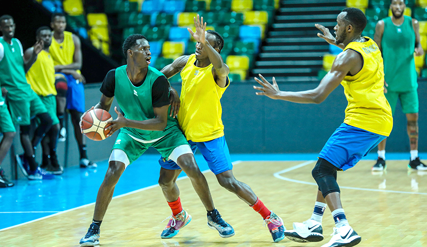 The national basketball team trains at the BK Arena recently. Rwanda will face South Sudan at the upcoming FIBA World Cup qualifiers. Photo: Dan Nsengiyumva.