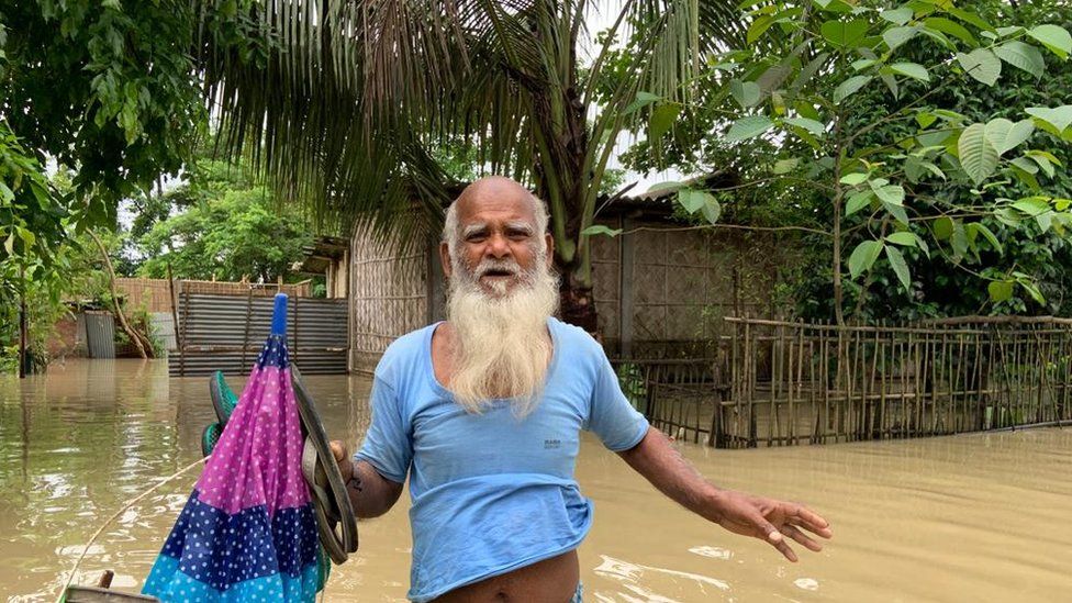 Siraj Ali refused to leave his home even though it was submerged under flood waters.
