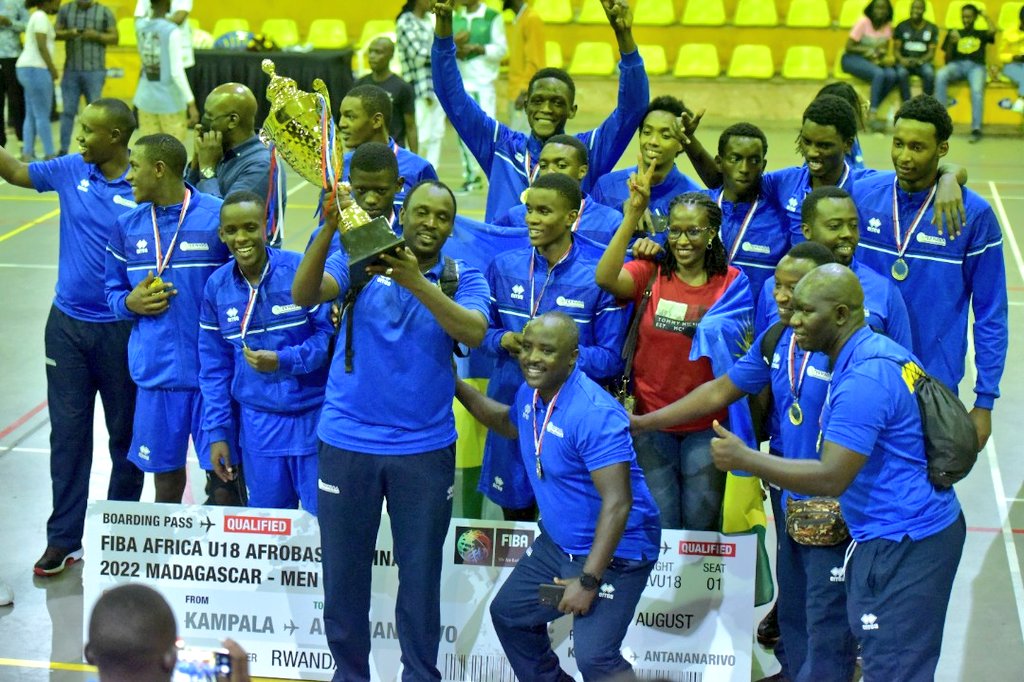 Rwandan players and technical staff celebrate with the trophy after emerging winners of a regional qualifiers tournament in Kampala, Uganda, last week. Photo: Courtesy.
