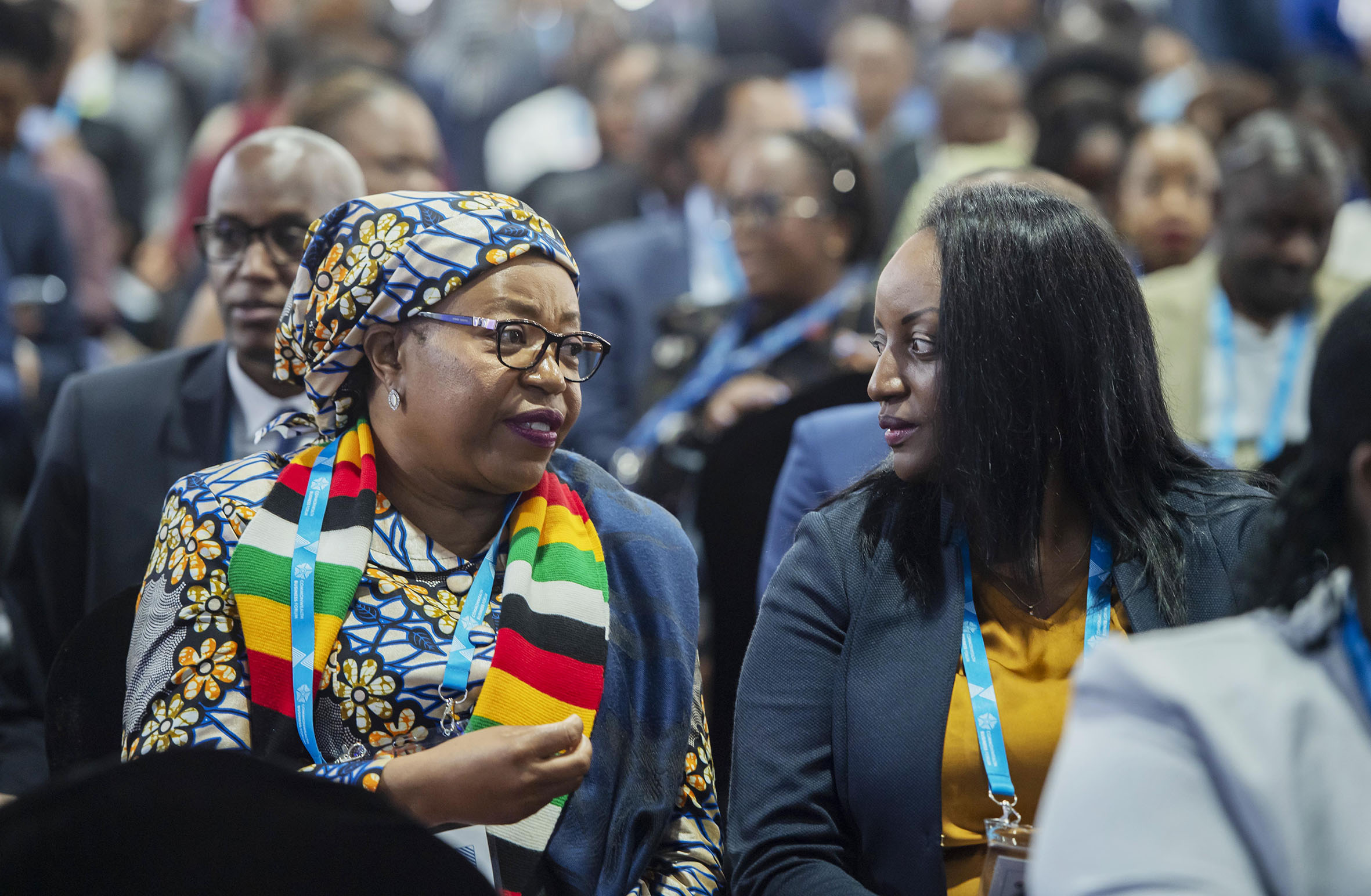 The Zimbabwean Ambassador to Rwanda, Charity Manyeruke interacts with Soraya Hakuziyaremye, Vice Governor of the Central Bank, during the commonwealth business forum in Kigali on June 21, 2022. 