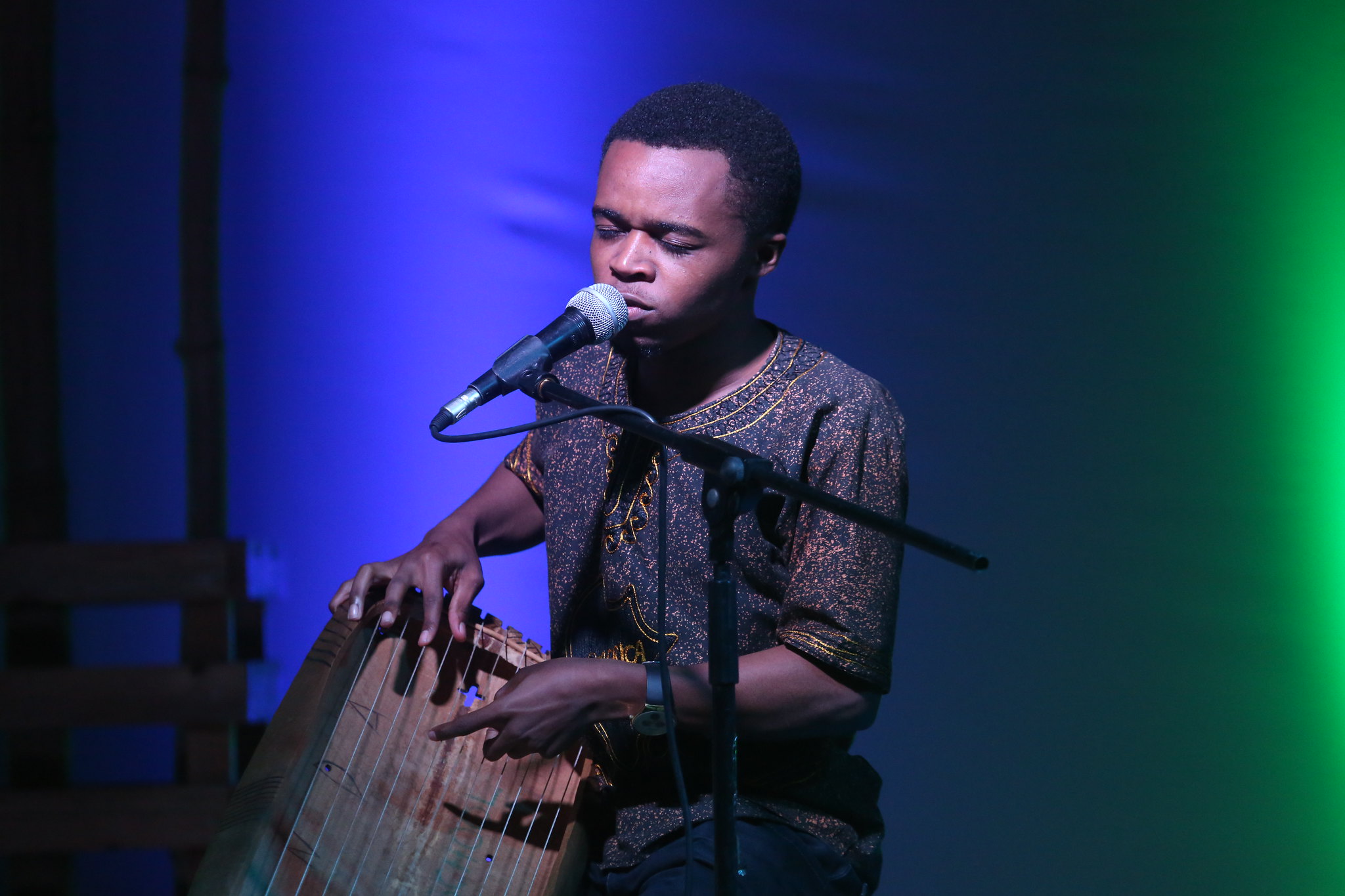 Deo Munyakazi, Inanga player and singer , is one the young artistes bringing traditional music back to life.