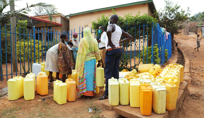 Residents of Masaka sector fetching water. Many households still face water shortage across the country. Photo/File.
