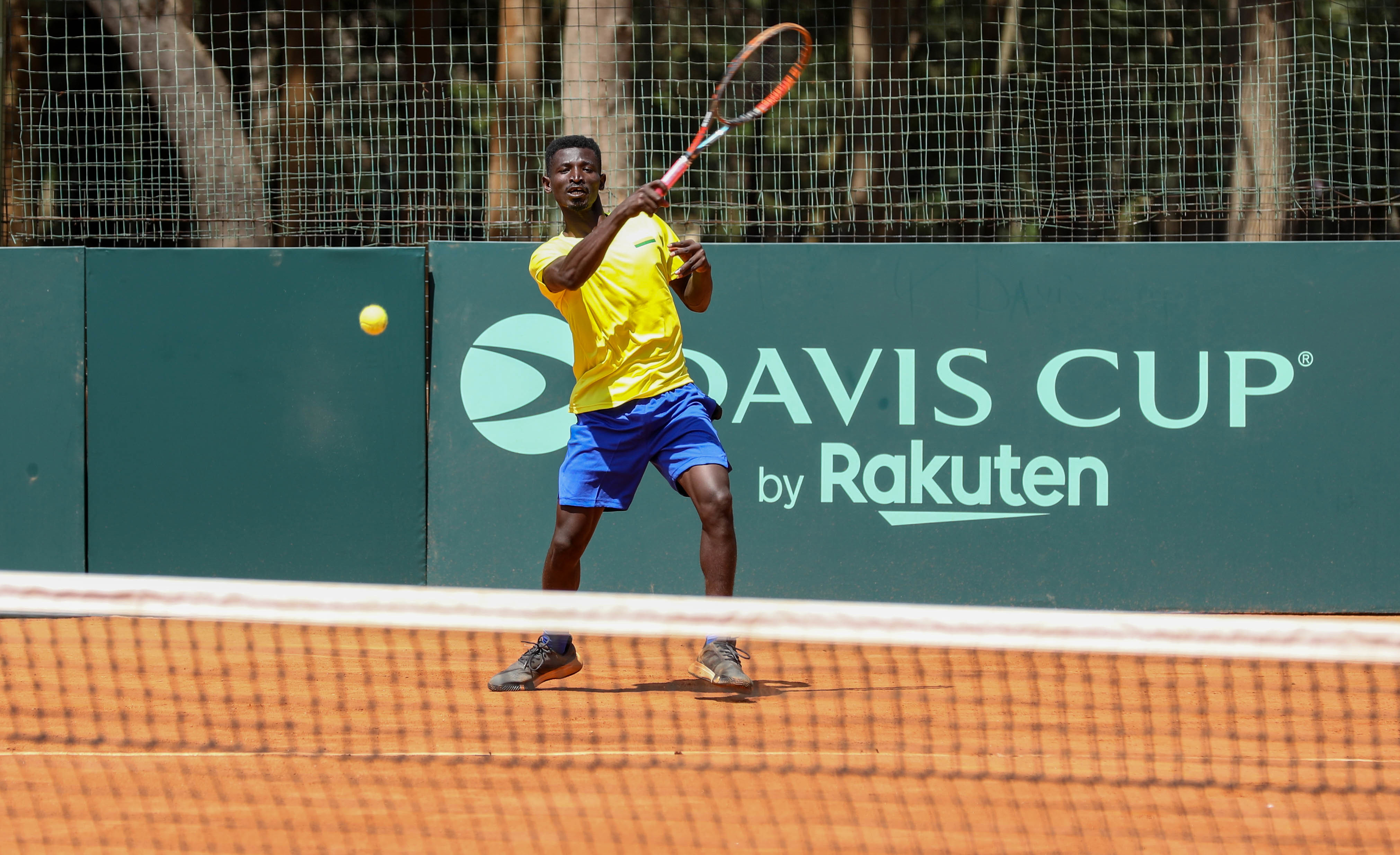 Ernest Habiyambere won the first singles match for Rwanda with a comfortable 2-0 victory (6-0, 6-0) over Ugandau2019s Ronald Naswali. Photo by Dan Nsengiyumva