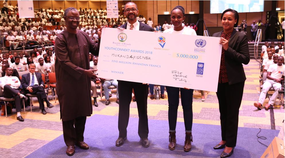 Mukandayisenga recieves a cheque of 5 Million Rwandan Francs during Youth Connekt 2018.  File photo.