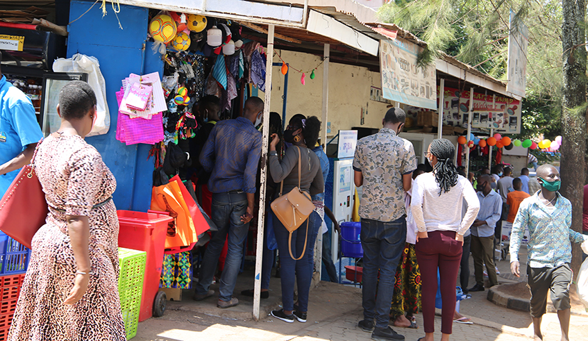 Clients buy different items at Kigali Business District in 2021. / Photo: Craish Bahizi.