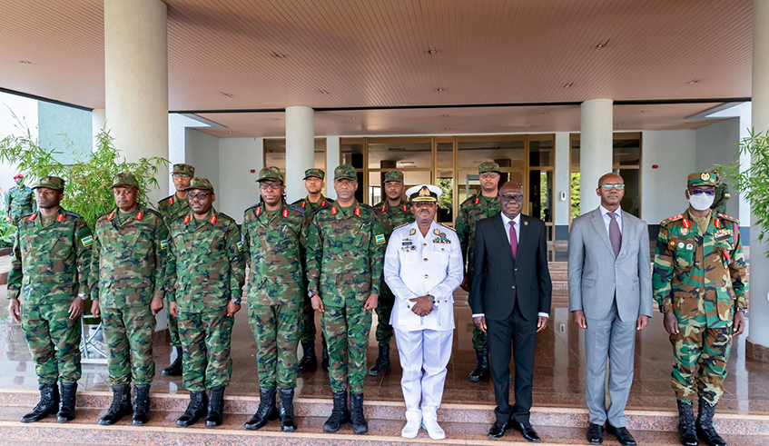 The two delegations pose for a group photo after bilateral security talks at RDF Headquarters in Kimihurura on Tuesday. Courtesy.