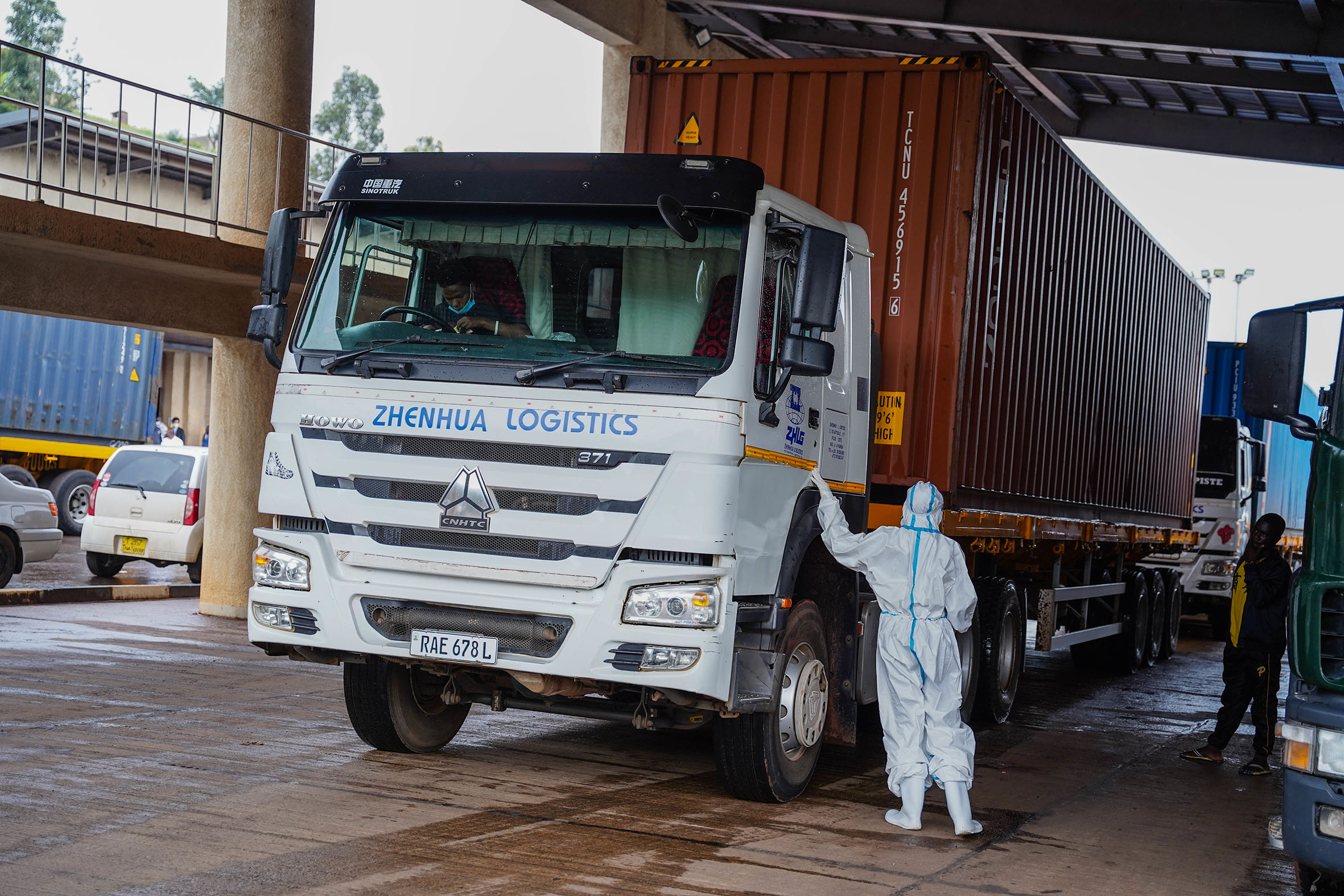 Cross-border trucks at the Rusumo One-Stop Border Post on March 16.  Photo: Dan Nsengiyumva.