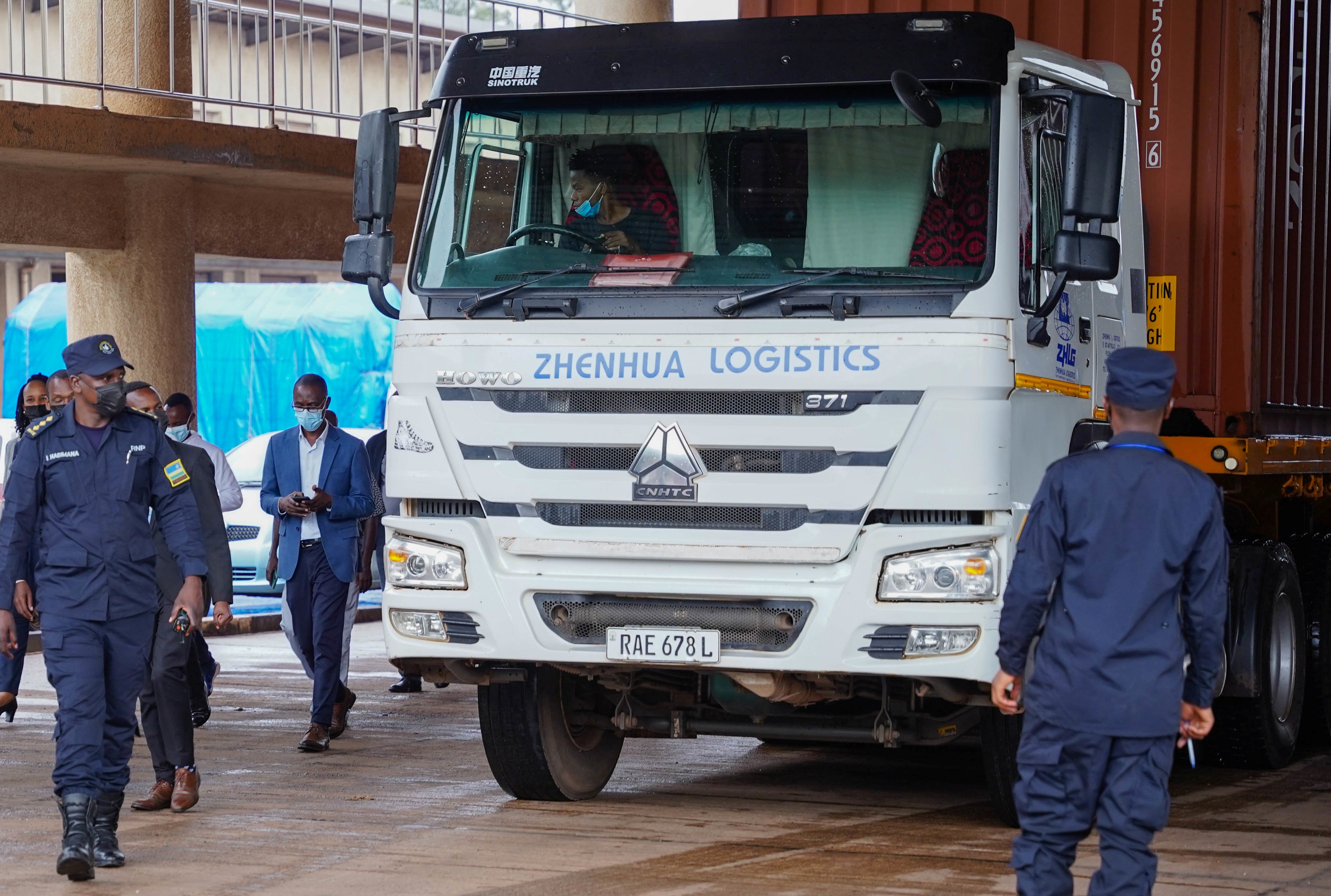 Rwanda National Police officers inspect a cross-border truck at Rusumo One-stop Border Post. Regional countries have been urged to collaborate on fighting cross-border crimes. 