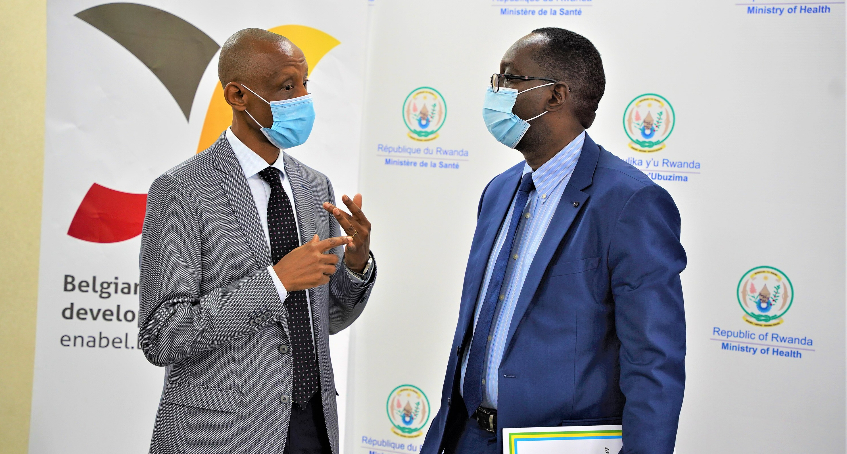 Minister for Health  Dr Daniel Ngamije interacts with Emile Bienvenue, the Director-General of Rwanda Food and Drugs Authority in a recent event. The ministry bans advertisement of medicines, medical services.