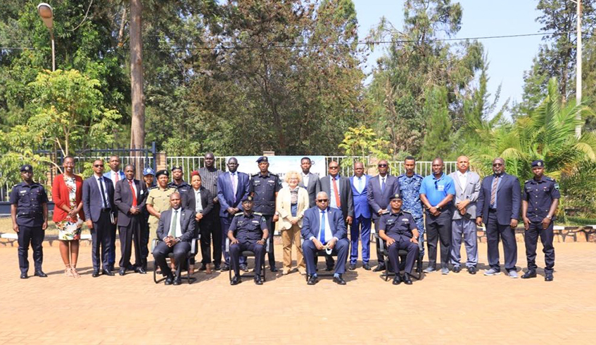 Officials pose for a group photo at the opening session of a week-long training of the African Union Operational Guidance Notes  on Disarmament, Demobilisation and Reintegration  and Arms Control at Gishari on July 11.Courtesy